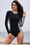 Women's Hourglass Long Sleeve Crew Neck One Piece Rashguard - Black and White Mottles and Dots